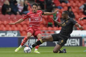 Kyle Knoyle in action against Crewe. Rovers' victory closed the gap on their relegation rivals. Picture: Howard Roe/AHPIX LTD