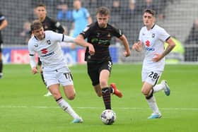 James Maxwell strides forward with the ball. Picture: Howard Roe/AHPIX LTD