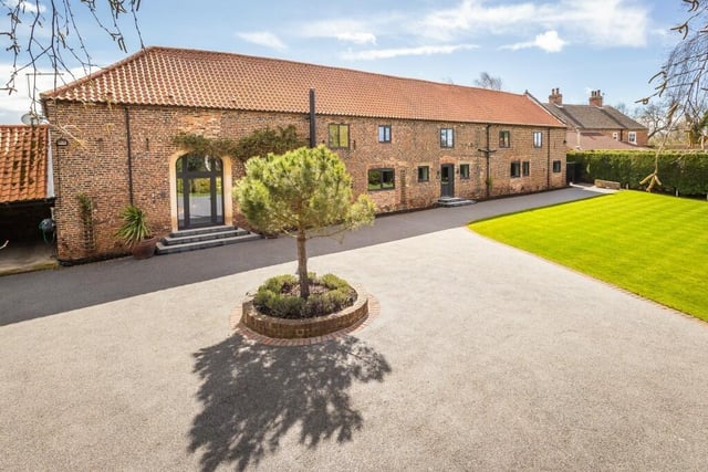 An impressive driveway and frontage.