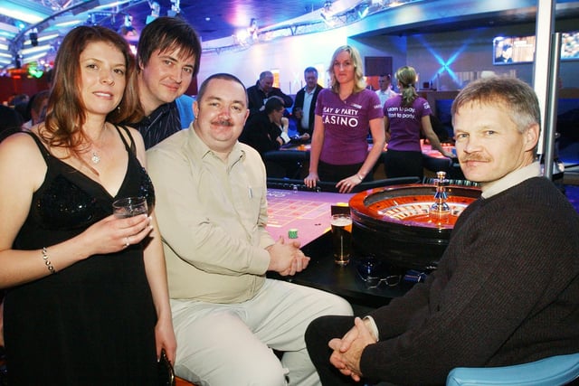 Pictured at the casino but do you recognise them?