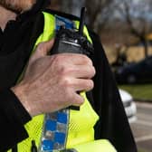 Police found a cannabis farmer asleep when officers raided a drug den