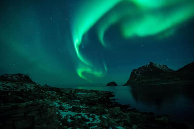 The Northern Lights are pictured on March 9, 2018, in Utakleiv, northern Norway, Lofoten islands, within the Arctic Circle. Picture: OLIVIER MORIN/AFP via Getty Images.