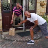 Alex Watson delivering one of the meals