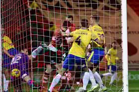 Doncaster take the lead against Colchester. (Picture Howard Roe/AHPIX LTD)