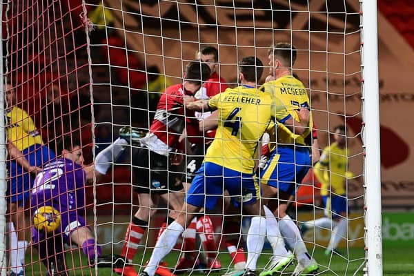 Doncaster take the lead against Colchester. (Picture Howard Roe/AHPIX LTD)