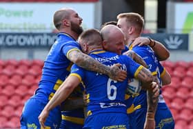 Dons' players celebrate Ben Johnston's try. Picture: Andrew Roe/AHPIX LTD