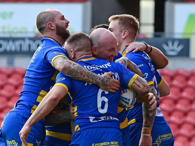 Dons' players celebrate Ben Johnston's try. Picture: Andrew Roe/AHPIX LTD