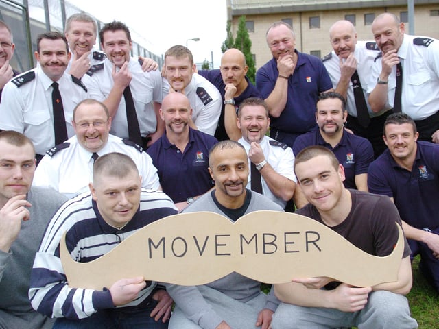 Prison officers, inmates, and Doncaster probations officers at HMP Moorlands have grown their moustaches for Movember in 2011