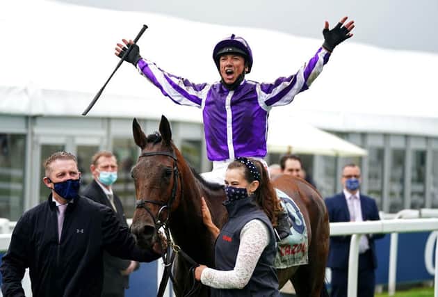 Frankie Dettori celebrates after winning the Cazoo Oaks with Snowfall at Epsom. Photo by John Walton - Pool/Getty Images