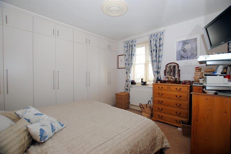 The principal bedroom, on the third floor, features "beautifully designed fitted wardrobes".