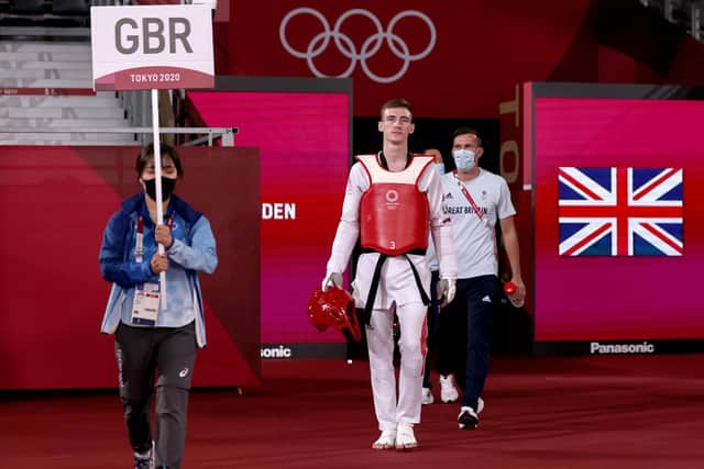 Bradly Sinden arrives to compete in the -68kg taekwondo gold medal contest. Photo by Maja Hitij/Getty Images