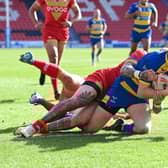 Josh Guzdek in action for the Dons.
