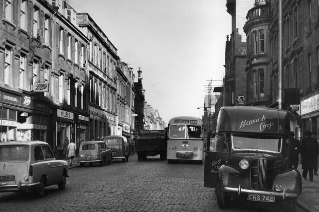 Traffic congestion in High Street. Town council may impose parking ban on one side of the street, November 1960.
