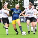 Belles’ Pheobe Sneddon is outnumbered against Derby County. Picture: Howard Roe/AHPIX LTD