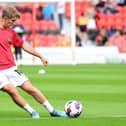 Doncaster's new signing Max Woltman warms up ahead of the Mansfield Town clash.