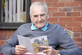 Adrian Slack and his book Cyril the Squirrel, of which he will donate proceeds from the sales to support Hazel ward and its staff.