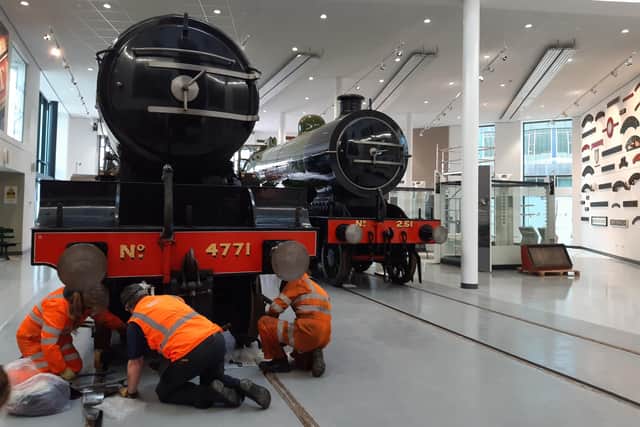 Green Arrow and number 251 next to each other in the new Doncaster rail heritage centre