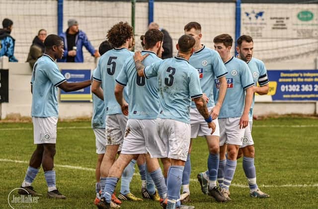Doncaster City are in pole position to win promotion with four games left.