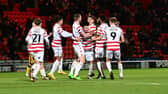 Charlie Seaman celebrates his goal for Doncaster Rovers.