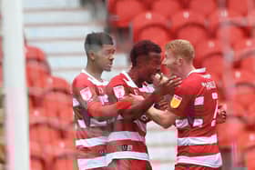 Madger Gomes celebrates his goal against Bristol Rovers