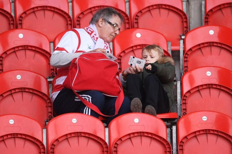 Doncaster Rovers fans sit in the stands prior to the FA Cup Fifth Round match between Doncaster Rovers and Crystal Palace at Keepmoat Stadium on February 17, 2019.