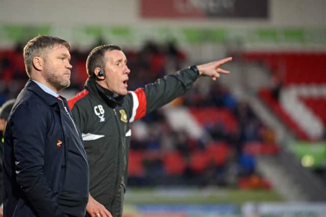 Rovers manager Grant McCann (left) and his assistant Cliff Byrne.