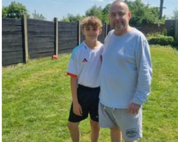 Chris Chapman with his grandson Bailey.