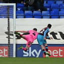 Tranmere's Paul Lewis scores the third goal.