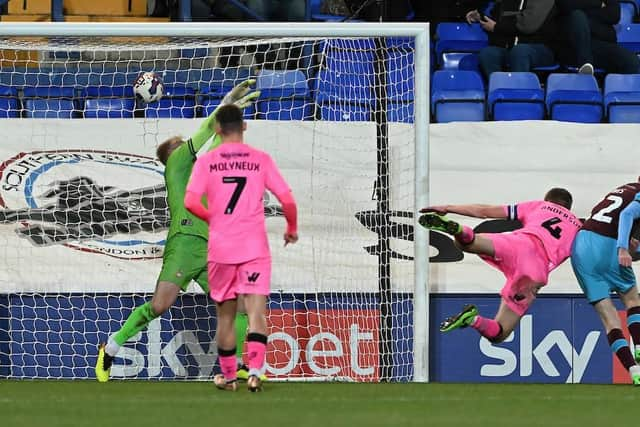 Tranmere's Paul Lewis scores the third goal.