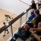 Peering down on Doncaster Squash Club's Joel Arscott competing against Dunnington's Seif Heikel in the Yorkshire Premier League (Picture: Tony Johnson)