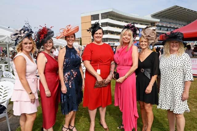 A group of women in their finery on Ladies' Day.