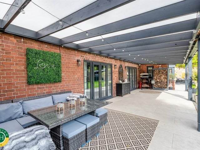 Outdoor seating with cover, perfect for entertaining.