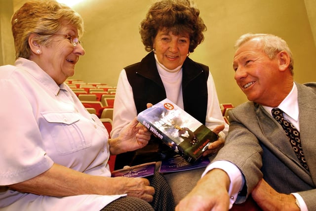 Former Arsenal keeper Bob Wilson at Chesterfield Library to promote his new book were he meet fans Dorren Hickling(left) and Betty Audus from Newbold in 2003