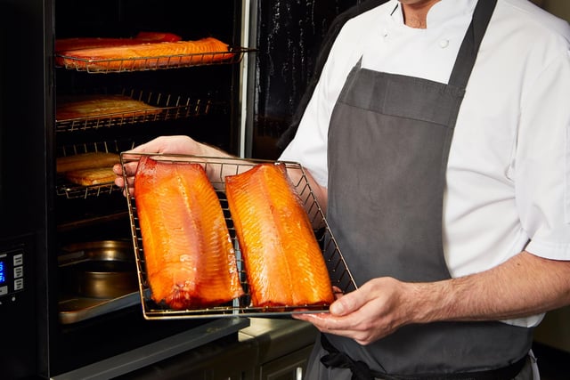 Menu choices, such as smoked salmon, are prepared by Fingal’s highly talented chefs in the custom built galley kitchen, which has been created in the ship’s former fuel tank.