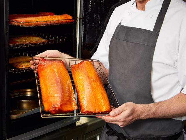Menu choices, such as smoked salmon, are prepared by Fingal’s highly talented chefs in the custom built galley kitchen, which has been created in the ship’s former fuel tank.