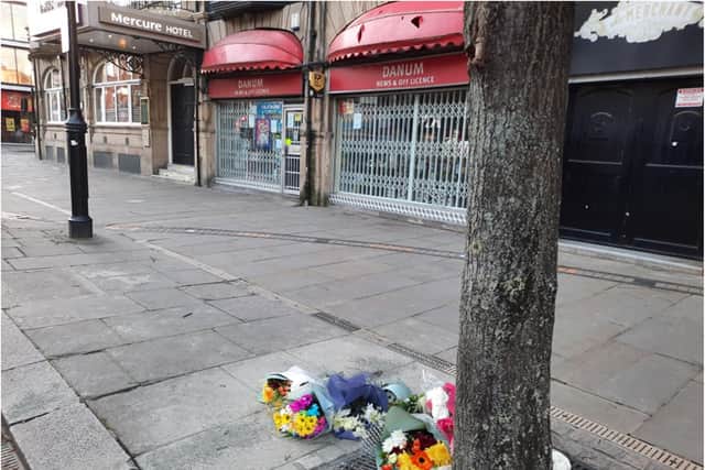 Flowers have been placed at the scene of Saturday night's tragedy.
