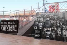 Local artist We Are Blok Heds wants to pay tribute to the city's coal and rail workers with this distinctive mural near the railway station. (Photo: We Are Blok Heds).