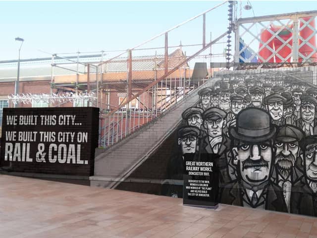 Local artist We Are Blok Heds wants to pay tribute to the city's coal and rail workers with this distinctive mural near the railway station. (Photo: We Are Blok Heds).
