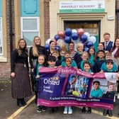 Staff and pupils celebrate their Ofsted