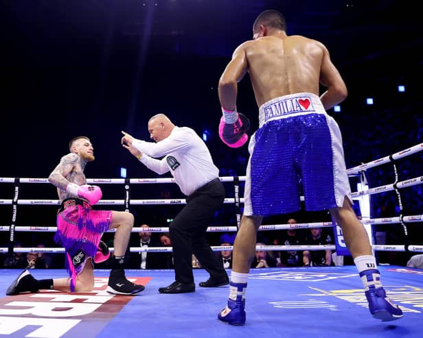 Gary Cully reacts after being knocked down by Jose Felix, as the Referee starts the count, during the Lightweight fight between Gary Cully and Jose Felix at The 3Arena Dublin on May 20, 2023 in Dublin, Ireland. (Photo by James Chance/Getty Images)