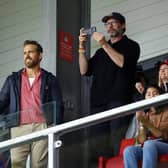 Wrexham co-owner Ryan Reynolds attended their first game of the season with actor Hugh Jackman (photo by Malcolm Couzens/Getty Images).