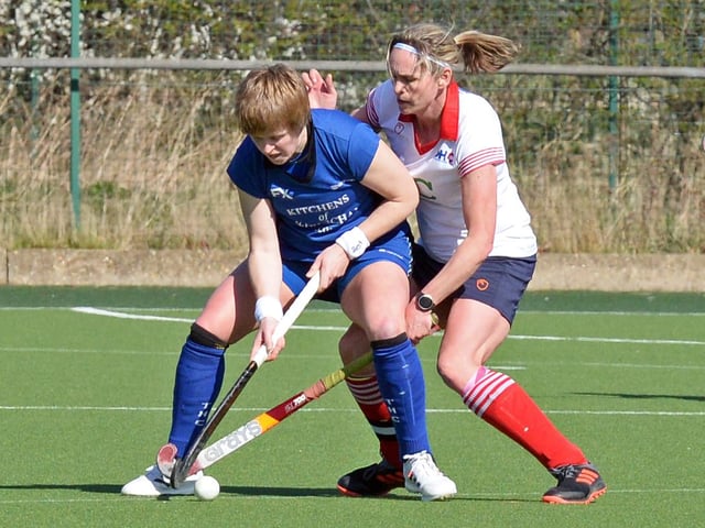 Doncaster captain Hannah Rockliff battles for possesion.
