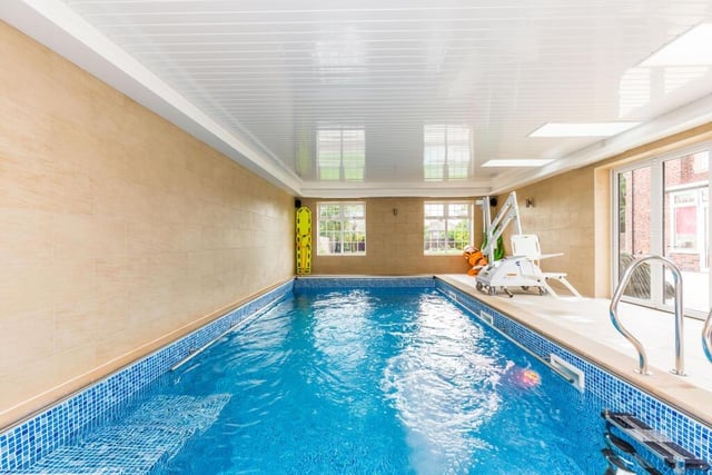 The heated swimming pool is part of a complex, with a hydro pool and changing rooms with showers.
