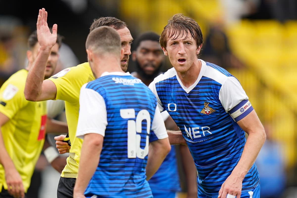 Doncaster Rovers 'take up options' on trio but what does that