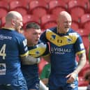 Doncaster’s Robbie Storey, centre, celebrates scoring a try with captain Sam Smeaton and winger Tom Halliday. Picture: Howard Roe/AHPIX.com