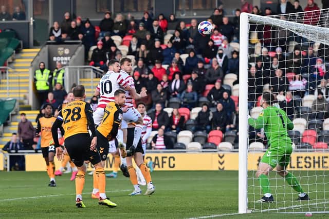 Tommy Rowe hits the crossbar with a header against Newport County.