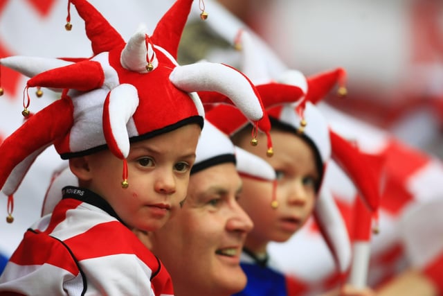 A young Doncaster Rovers fan looks on after his side's famous Wembley win.