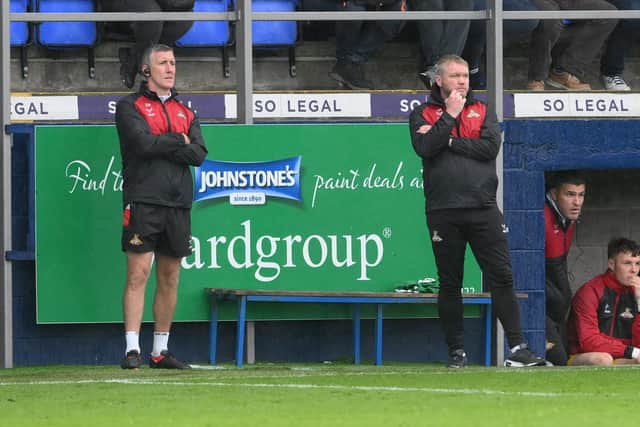 Doncaster Rovers' assistant manager Cliff Byrne (left) and manager Grant McCann.
