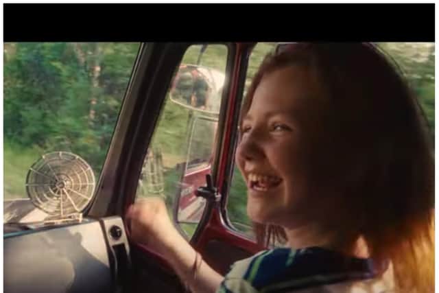 Evie-Rose Robinson stars in the new advert about a truck driver and his daughter. (Photo: Daimler Financial Truck Services).