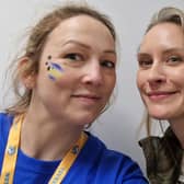 Lauar pictured volunteering at Leeds Rhinos on Friday night with netabll royalty Tamsin Greenway.